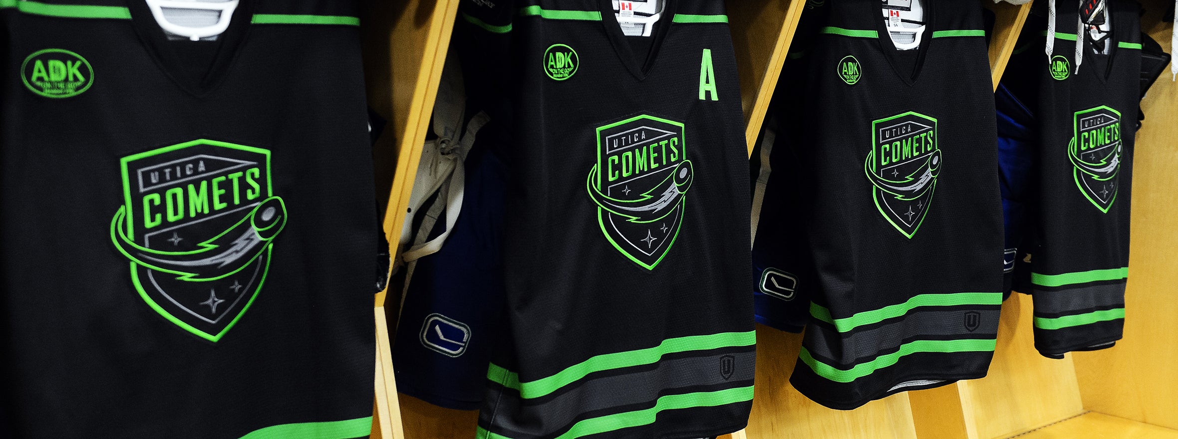 black and green canucks jersey